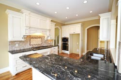 Black Granite kitchen white cabinets - Baldwin NY Quartz and Granite