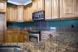 brown Granite kitchen - Kennebunk Quality Granite and Cabinetry