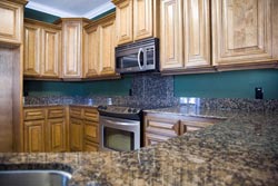 brown Granite kitchen - Tampa New Image Marble and Granite